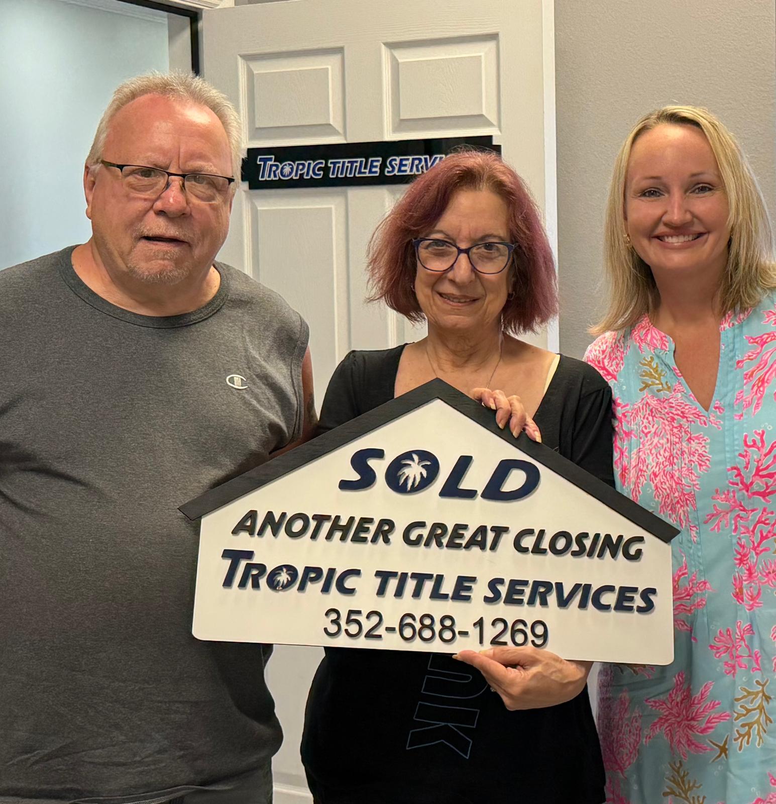 Karen celebrating a successful closing with her clients